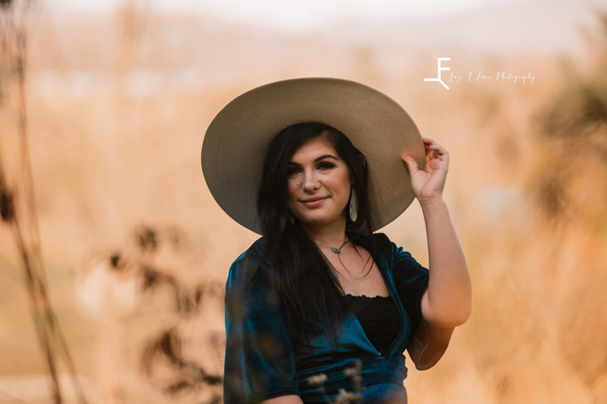 Laze L Farm Photography | Western Lifestyle | Taylorsville NC | posing with the hat in the field 