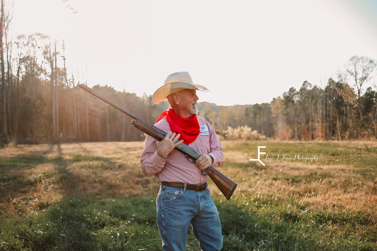 Laze L Farm Photography | Farm Session | Cleveland NC | posing with the rifle