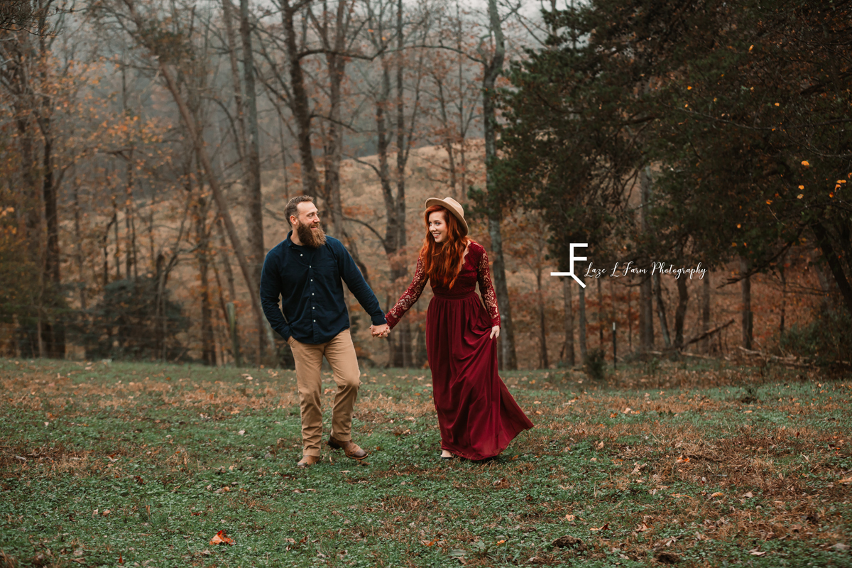 Laze L Farm Photography | Farm Session | Taylorsville NC | candid of the couple walking