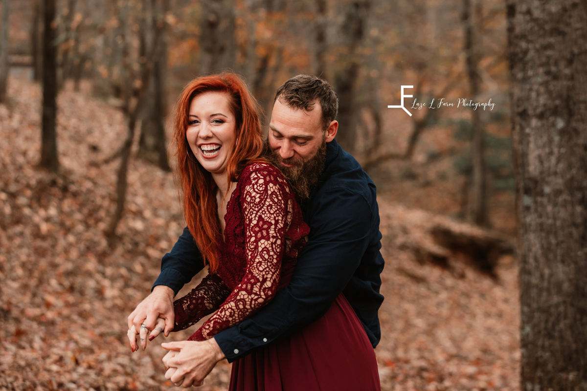 Laze L Farm Photography | Farm Session | Taylorsville NC | candid laughing and hugging