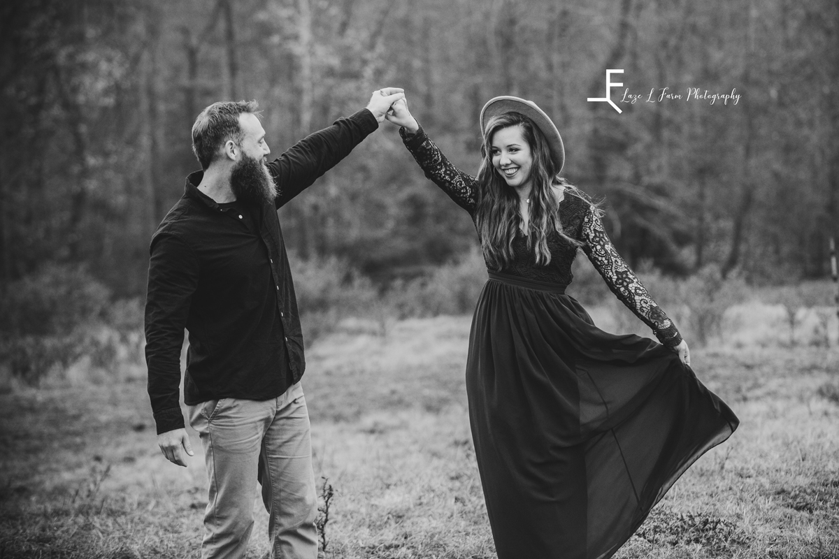 Laze L Farm Photography | Farm Session | Taylorsville NC | black and white twirling in the field