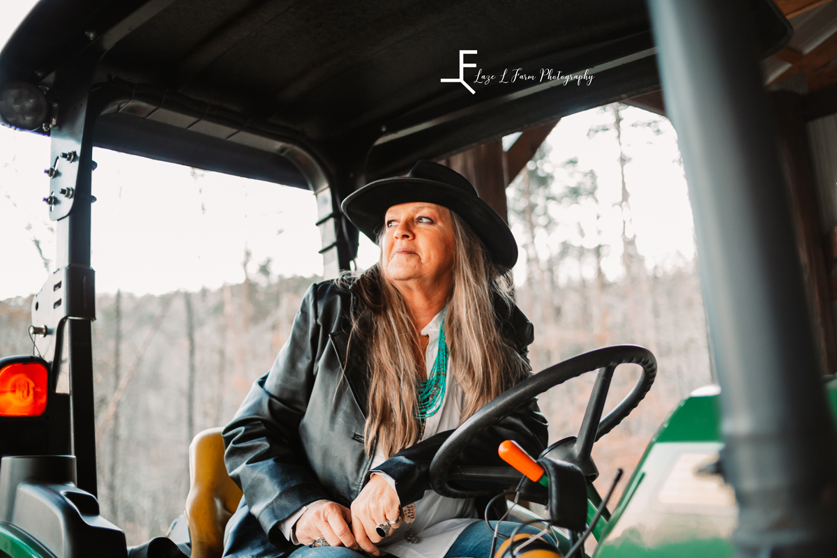 Laze L Farm Photography | western Lifestyle | Taylorsville NC | looking away sitting in the tractor