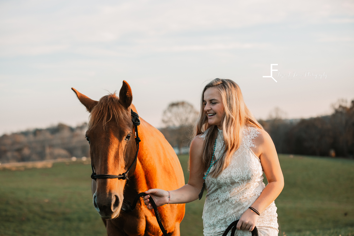 Laze L Farm Photography | Western Lifestyle | Taylorsville NC | anna walking her horse, client dress
