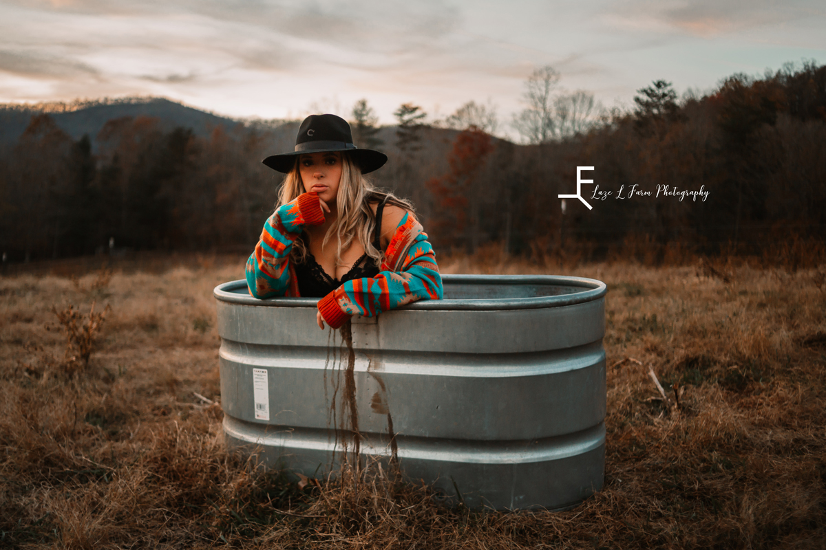 Laze L Farm Photography | Beth dutton | Water Trough | Taylorsville NC | wearing the jacket in the field