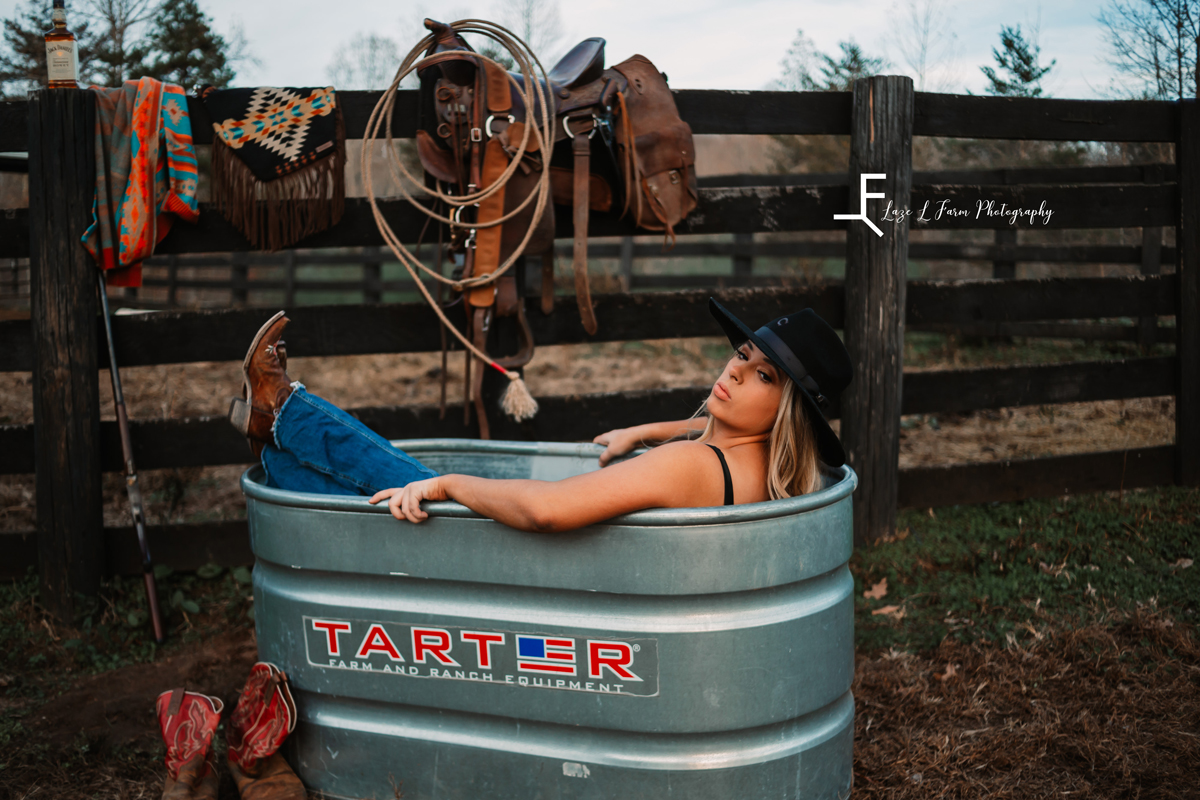 Laze L Farm Photography | Beth dutton | Water Trough | Taylorsville NC | looking back at the camera