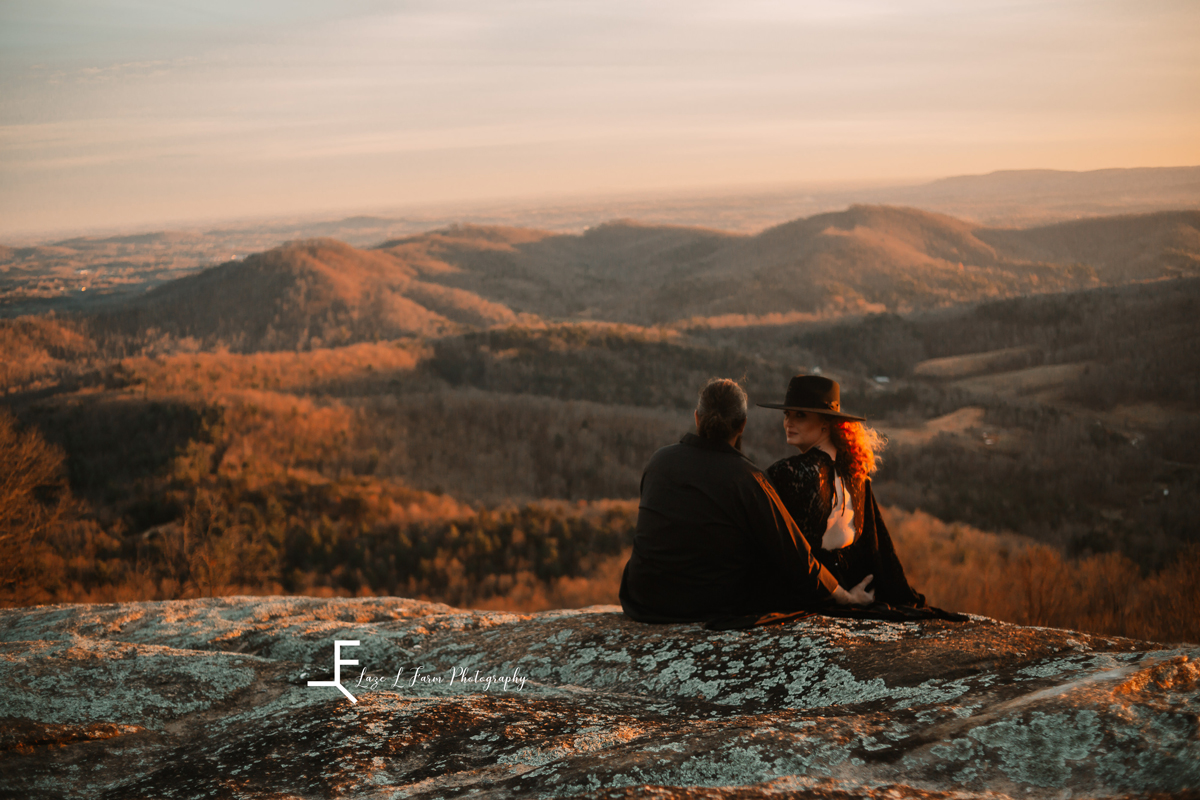 Laze L Farm Photography | Engagement | Taylorsville NC | couple sitting together looking at the view