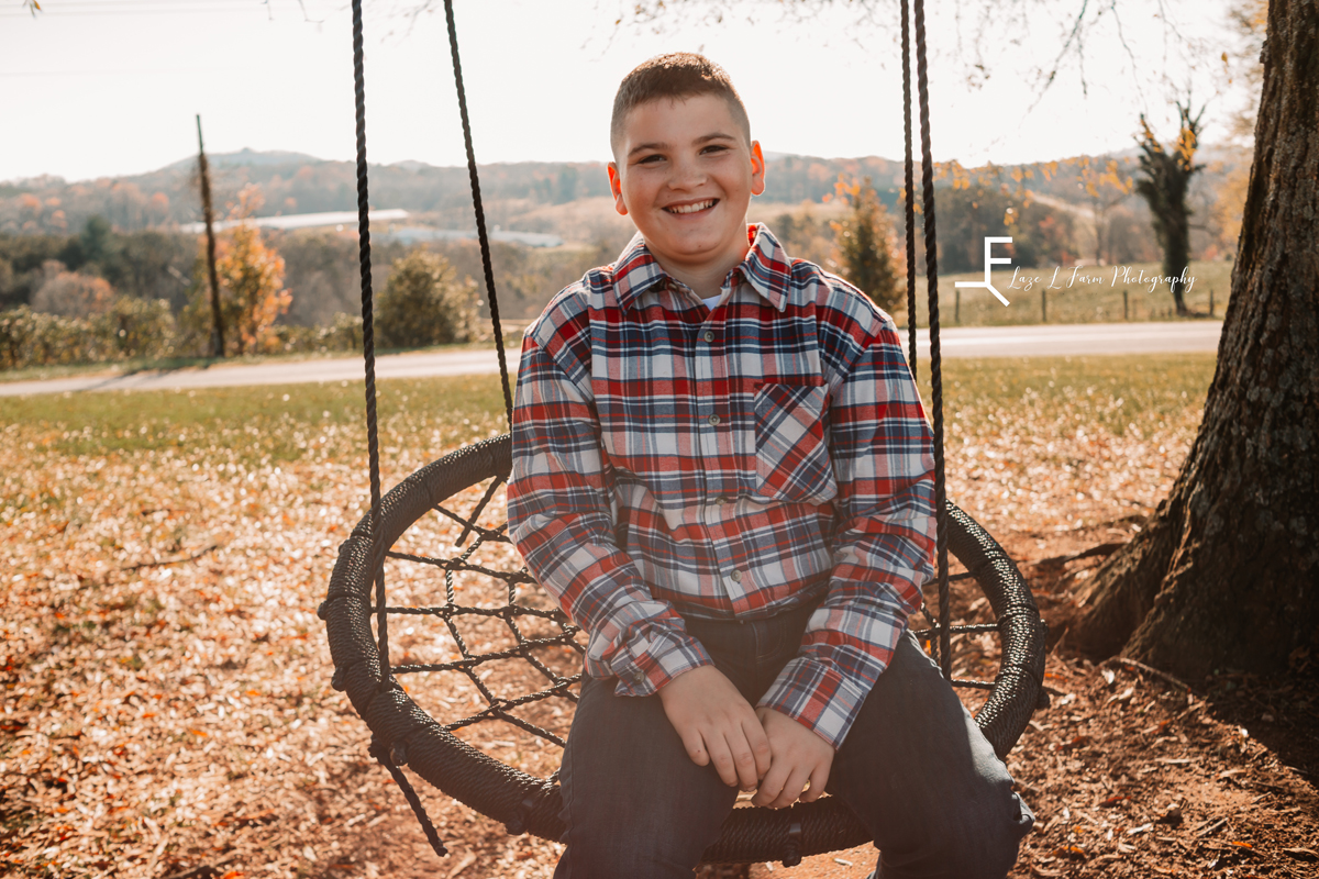 Laze L Farm Photography | Farm Session | Taylorsville NC | oldest brother on the swing