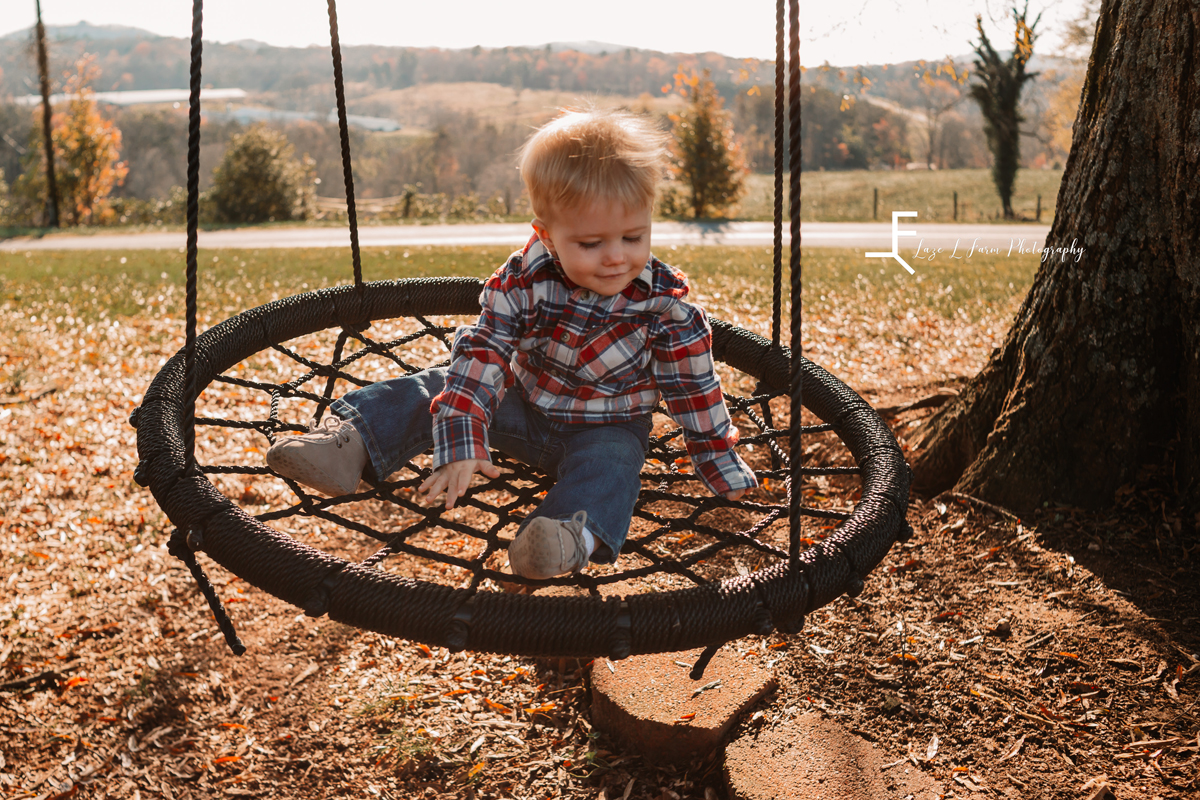 Laze L Farm Photography | Farm Session | Taylorsville NC | solo of baby on the swing