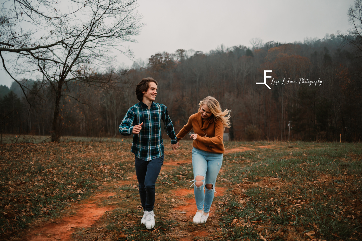 Laze L Farm Photography | Farm Session | Taylorsville NC | holding hands and running down the path