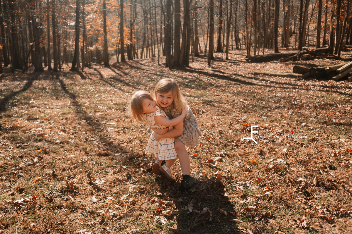 Laze L Farm Photography | Farm Session | Taylorsville NC | sisters hugging