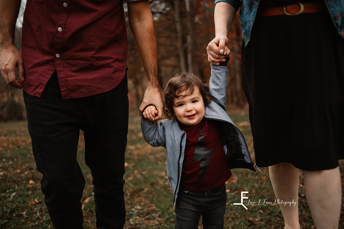Laze L Farm Photography | Farm Session | Taylorsville NC | holding hands with mom and dad