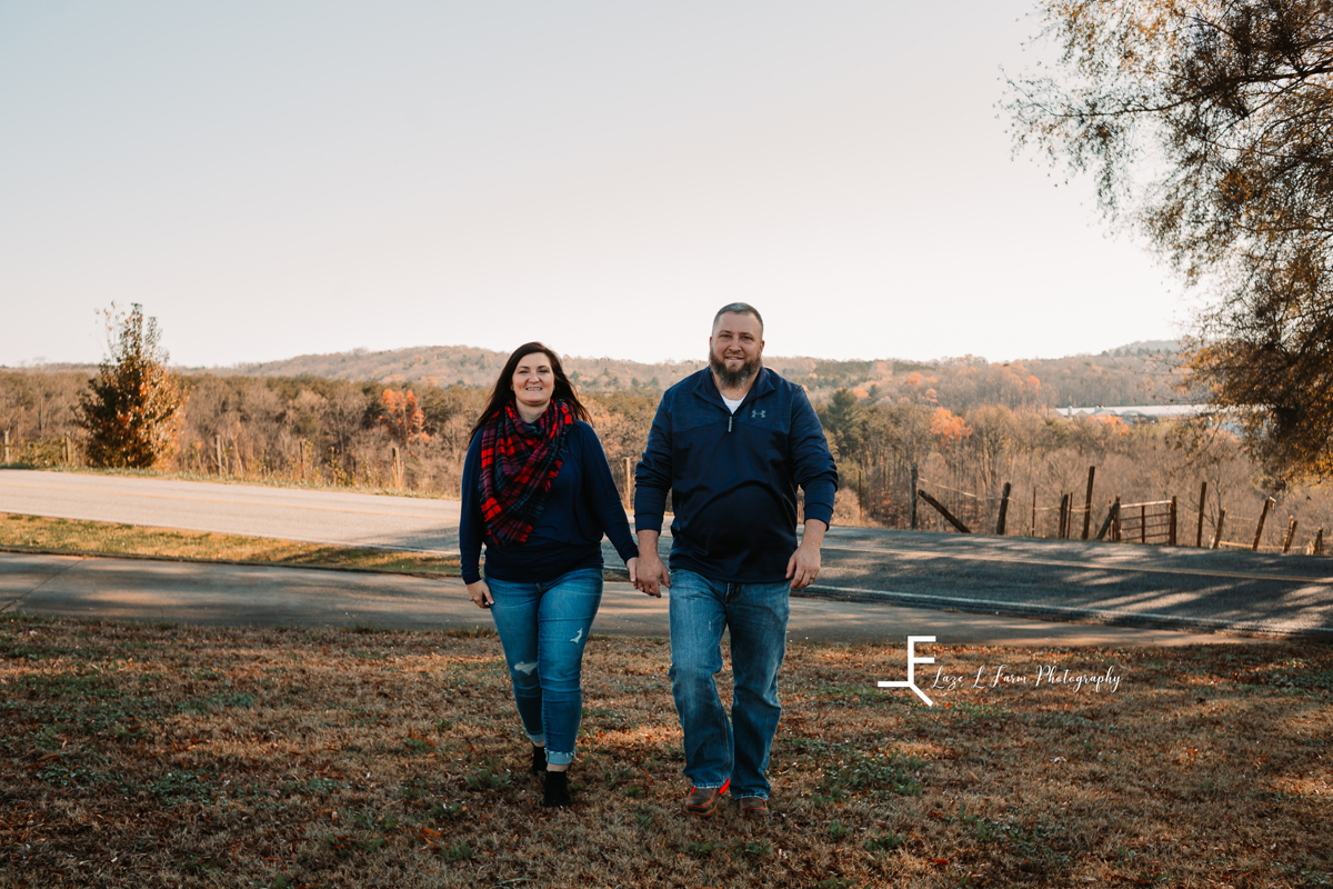Laze L Farm Photography | Farm Session | Taylorsville NC | couple walking towards camera