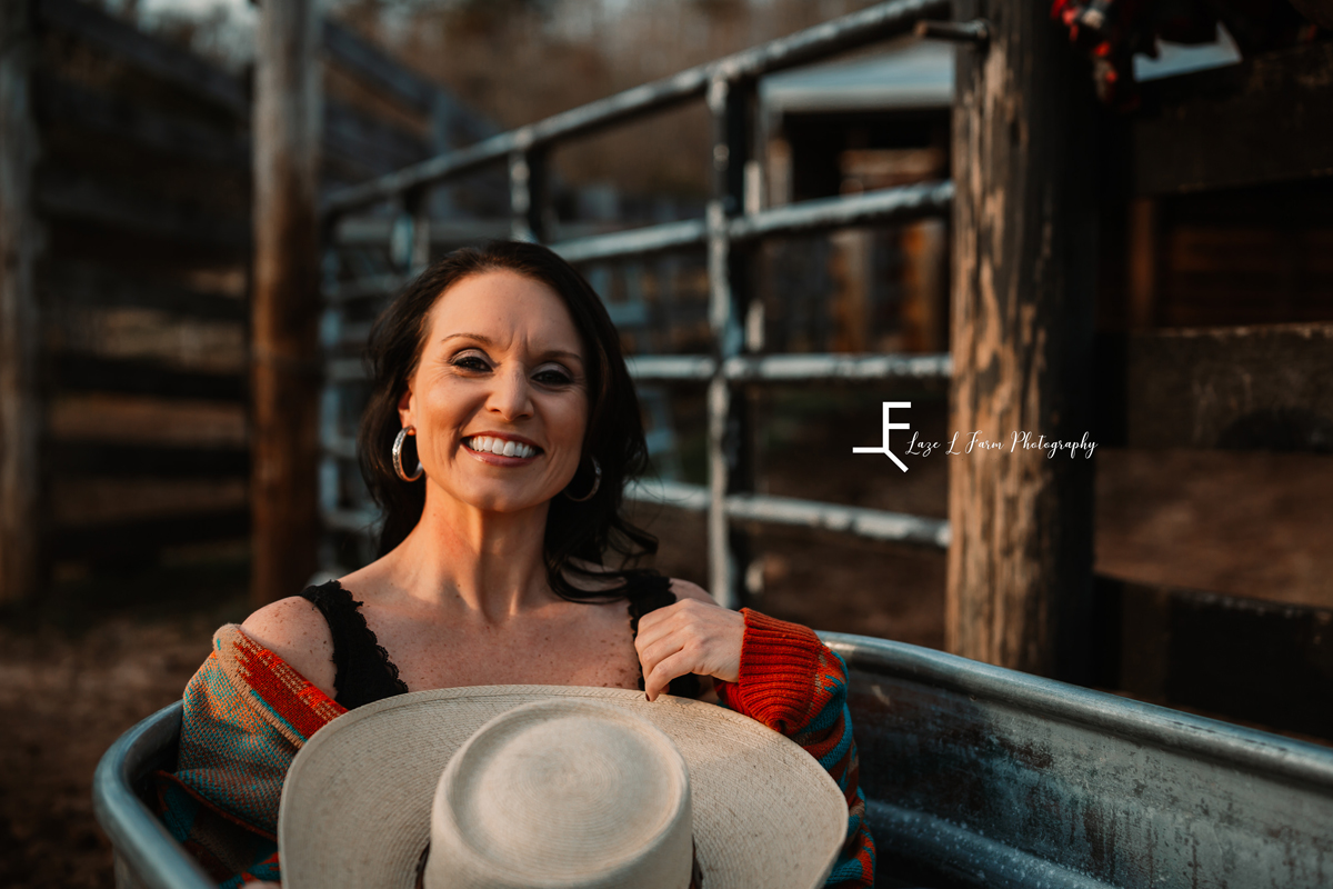 Laze L Farm Photography | Western Lifestyle | Taylorsville NC | shot of Jennie smiling in the trough