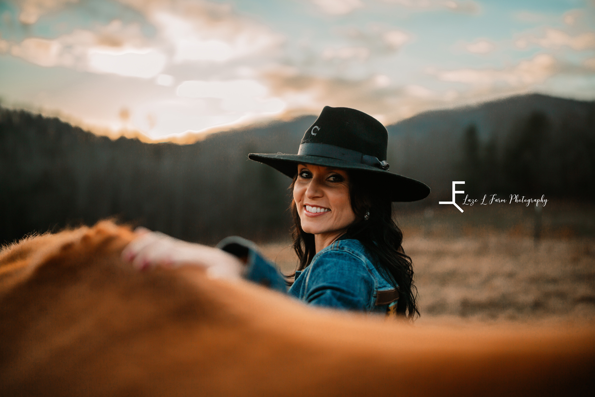Laze L Farm Photography | Western Lifestyle | Taylorsville NC | close up of jennie smiling behind the horse