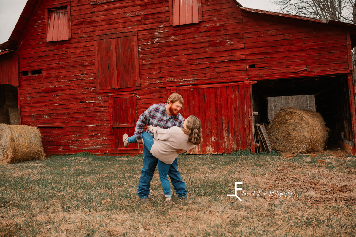 Laze L Farm Photography | Engagement Session | Taylorsville NC | twirling in front of the barn