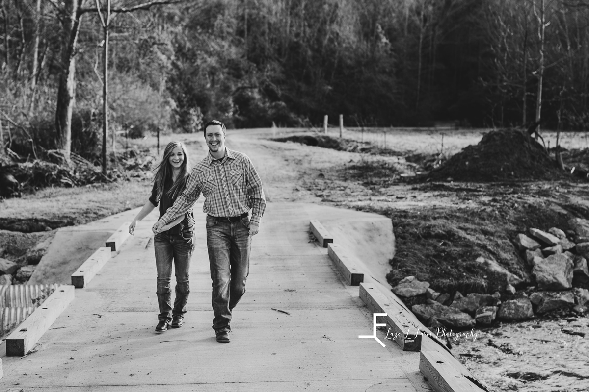 Laze L Farm Photography | Engagement Session | Taylorsville NC | candid walking towards camera