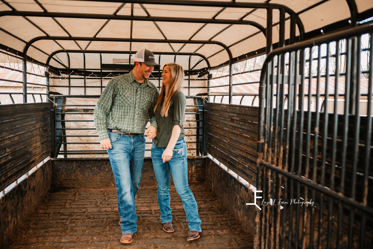 Laze L Farm Photography | Engagement Session | Taylorsville NC | candid in the trailer