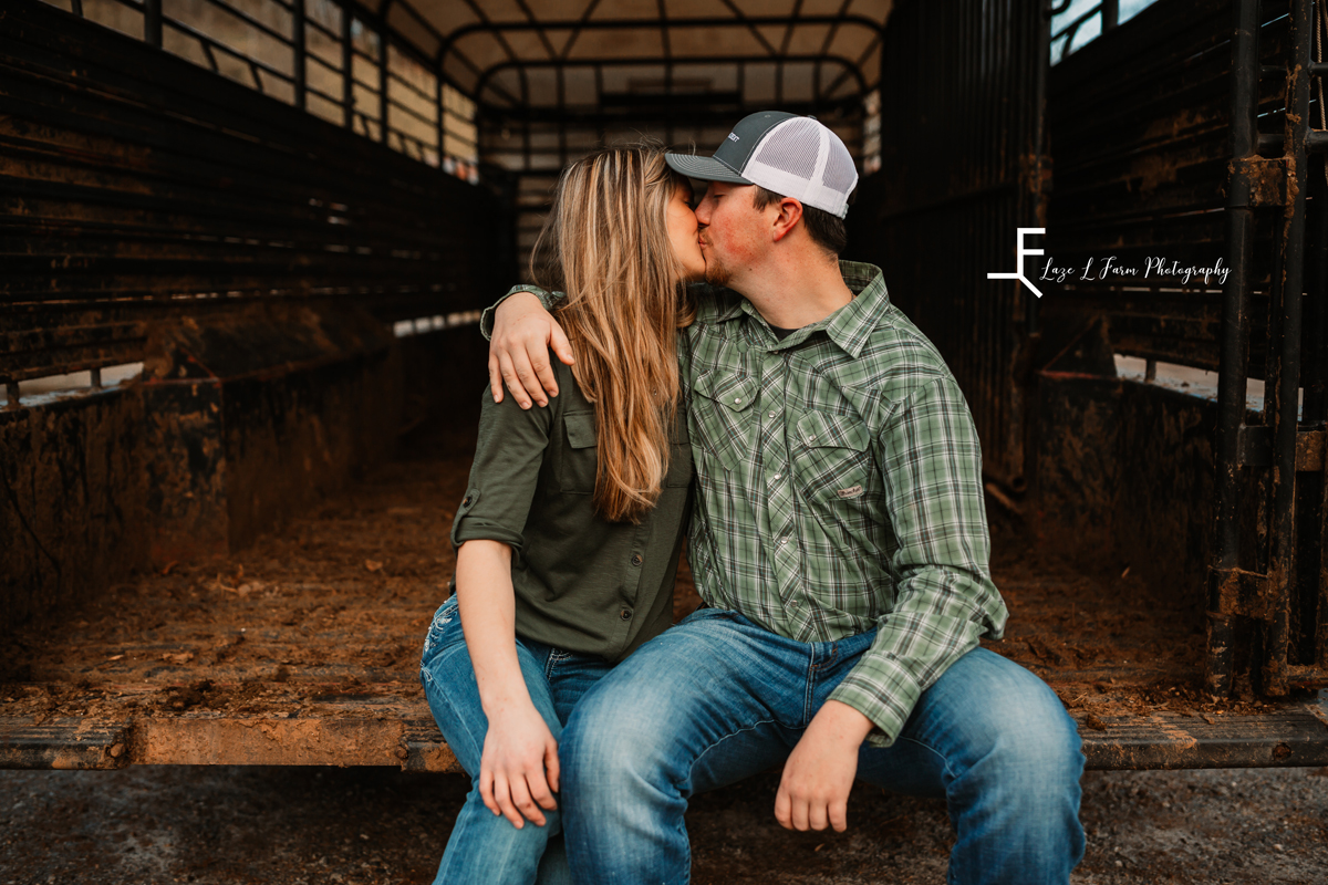 Laze L Farm Photography | Engagement Session | Taylorsville NC | kissing in the trailer