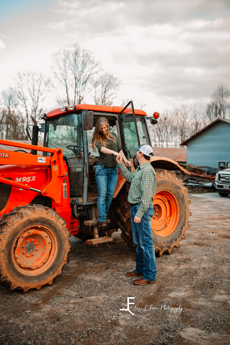Laze L Farm Photography | Engagement Session | Taylorsville NC | candid on the tractor