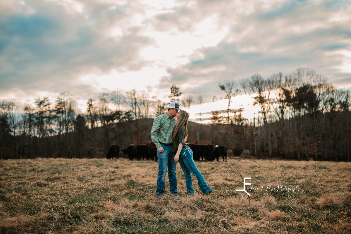 Laze L Farm Photography | Engagement Session | Taylorsville NC | kissing in the field