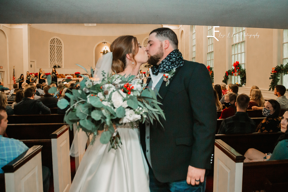Laze L Farm Photography | Wedding | Yadkinville NC | couple kiss at the end of the aisle