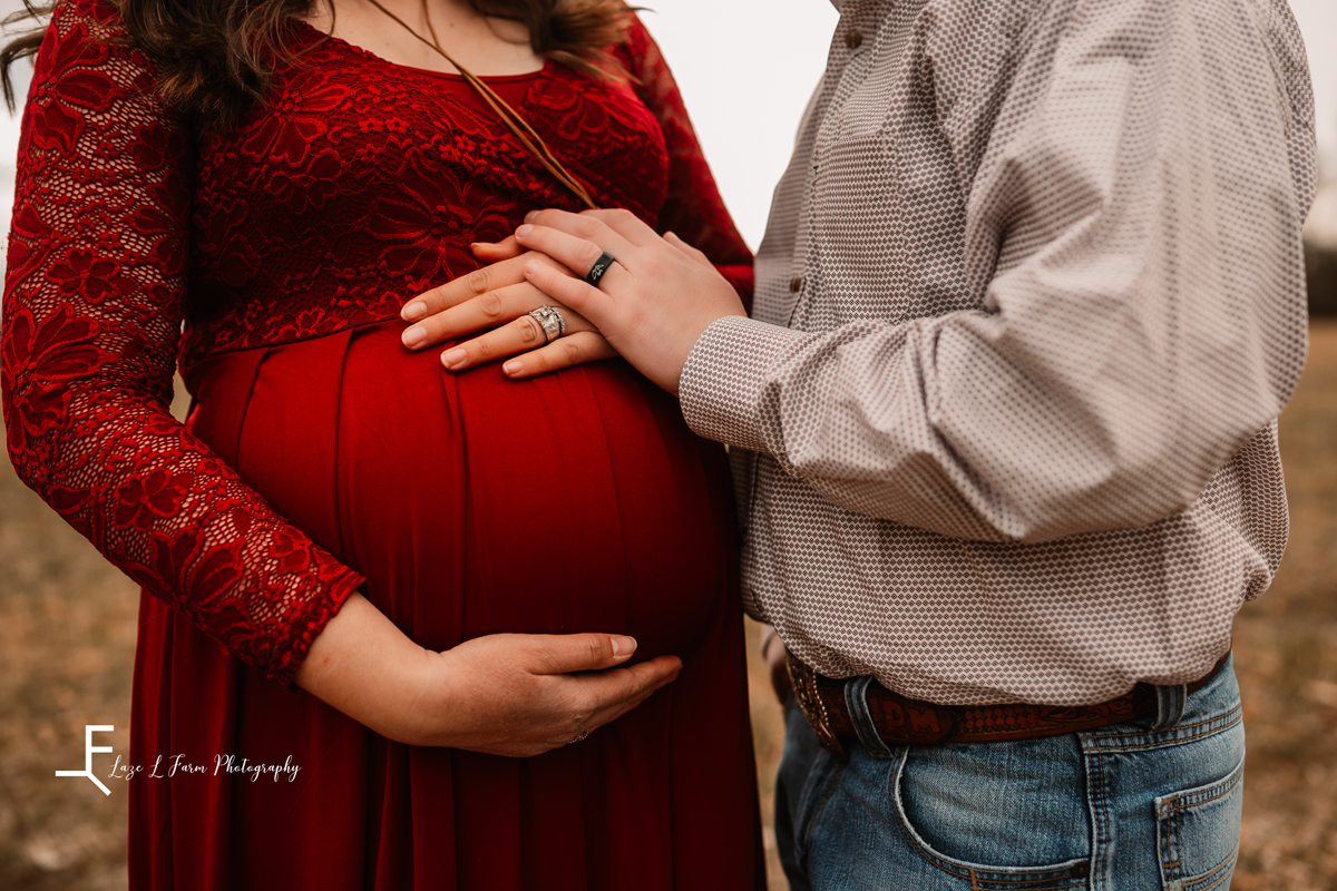 Laze L Farm Photography | Equine Maternity Session | Bethlehem NC | close up of couple holding baby belly