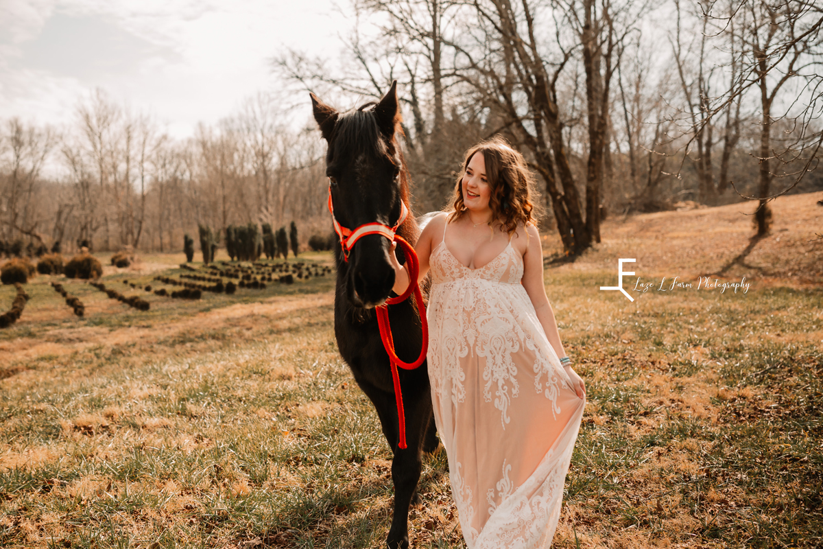 Laze L Farm Photography | Equine Maternity Photoshoot | Lenoir NC | walking with horse on lead rope