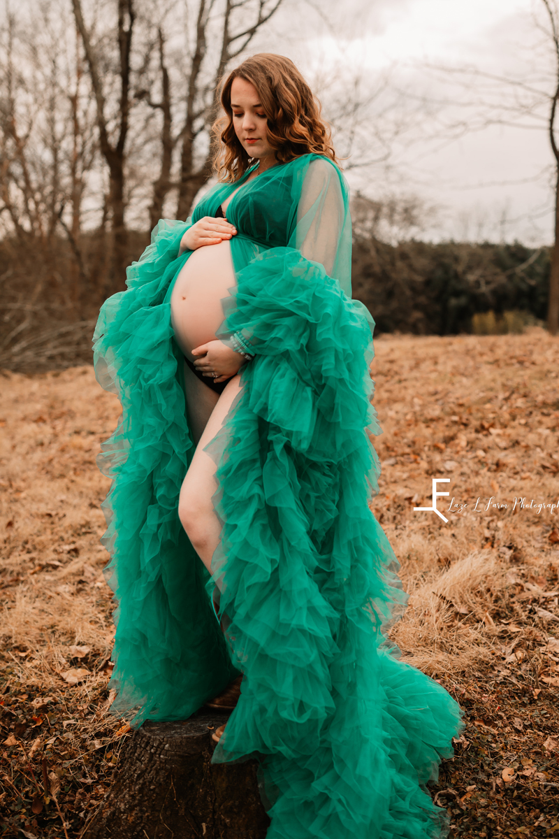 Laze L Farm Photography | Equine Maternity Photoshoot | Lenoir NC | posing baby belly in green dress