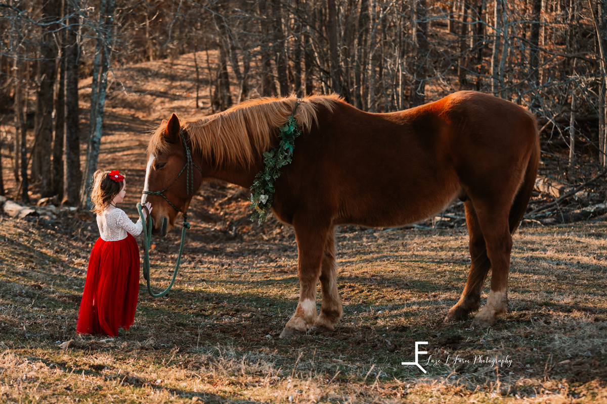 Laze L Farm Photography | Farm Session | Taylorsville NC | daughter holding horse's lead rope
