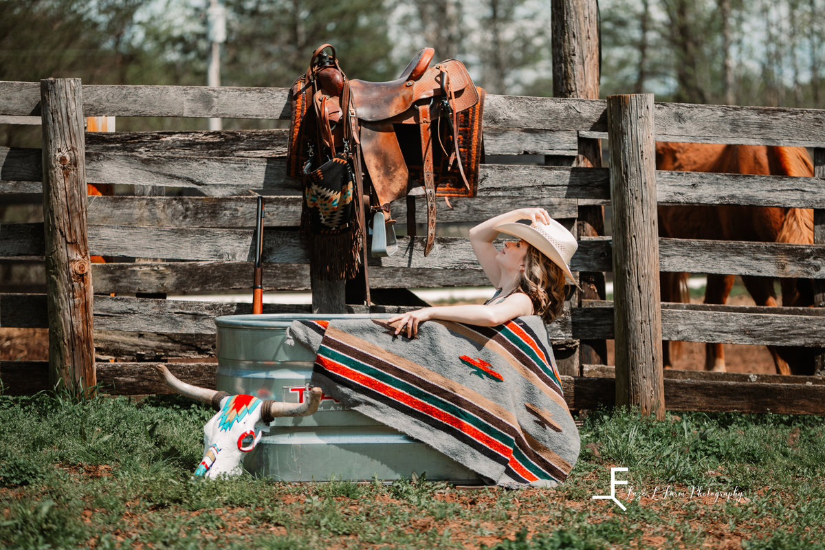 Laze L Farm Photography | Beth Dutton Water Trough | posing laying in the trough