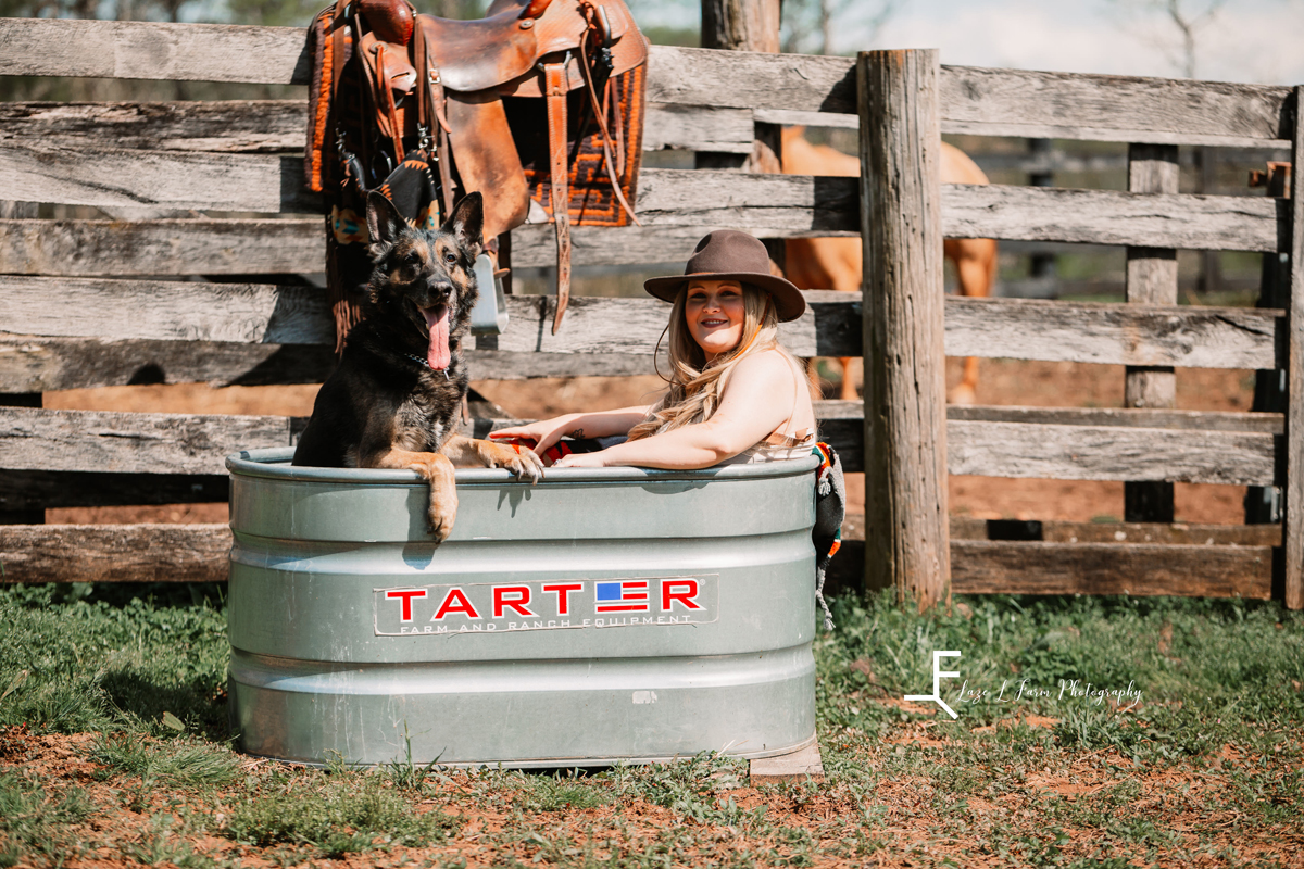 Laze L Farm Photography | Beth Dutton Water Trough | sitting in the trough with the dog 