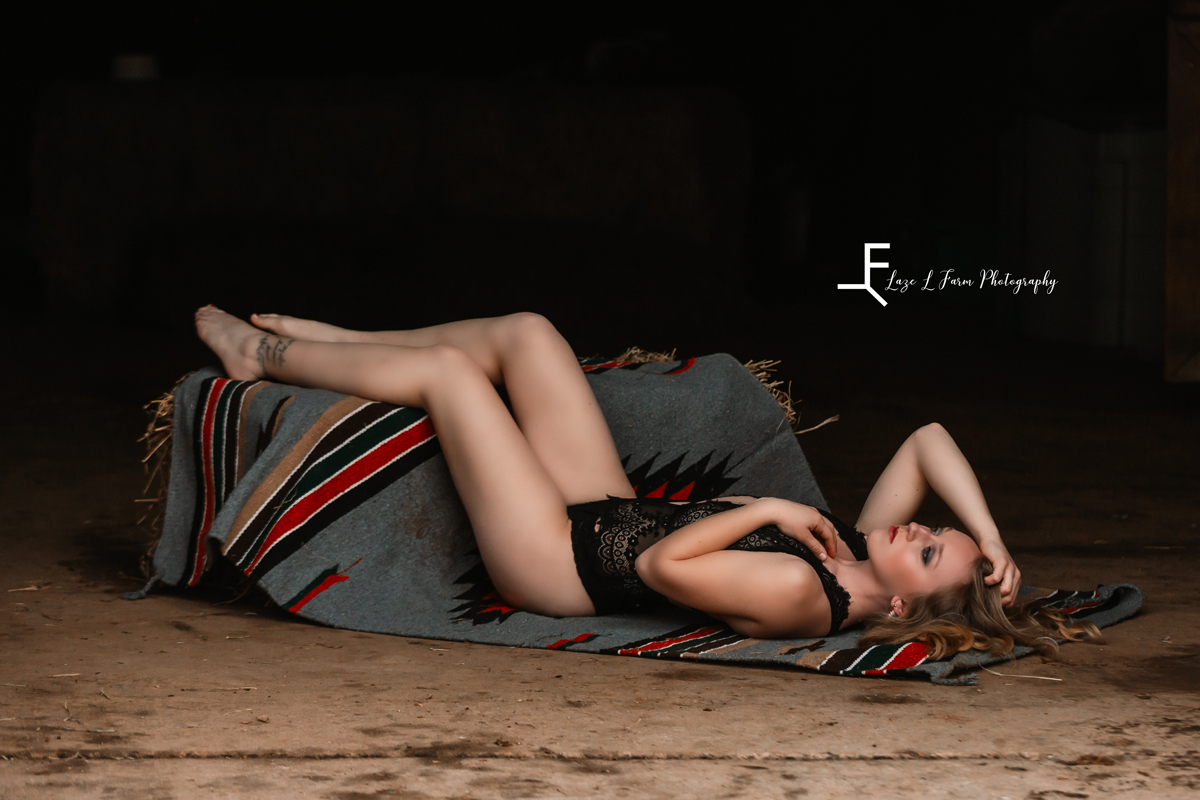 Laze L Farm Photography | Cowgirl Boudoir | Hamptonville NC | laying on the ground