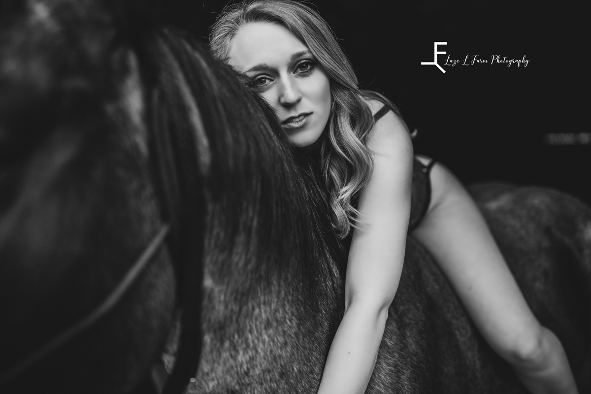 Laze L Farm Photography | Cowgirl Boudoir | Hamptonville NC | leaning over the horse