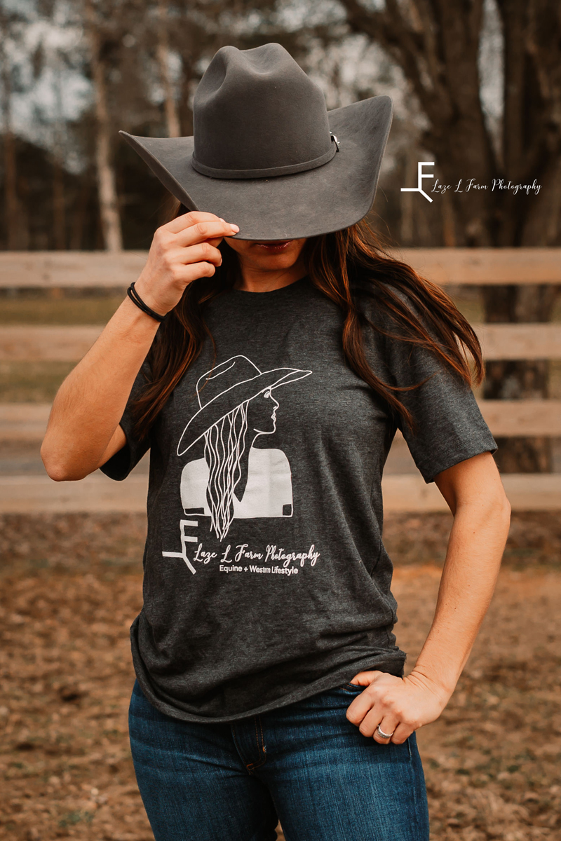 Laze L Farm Photography | Dream Catcher Farm | Hamptonville NC | modeling t shirt and tipping her hat