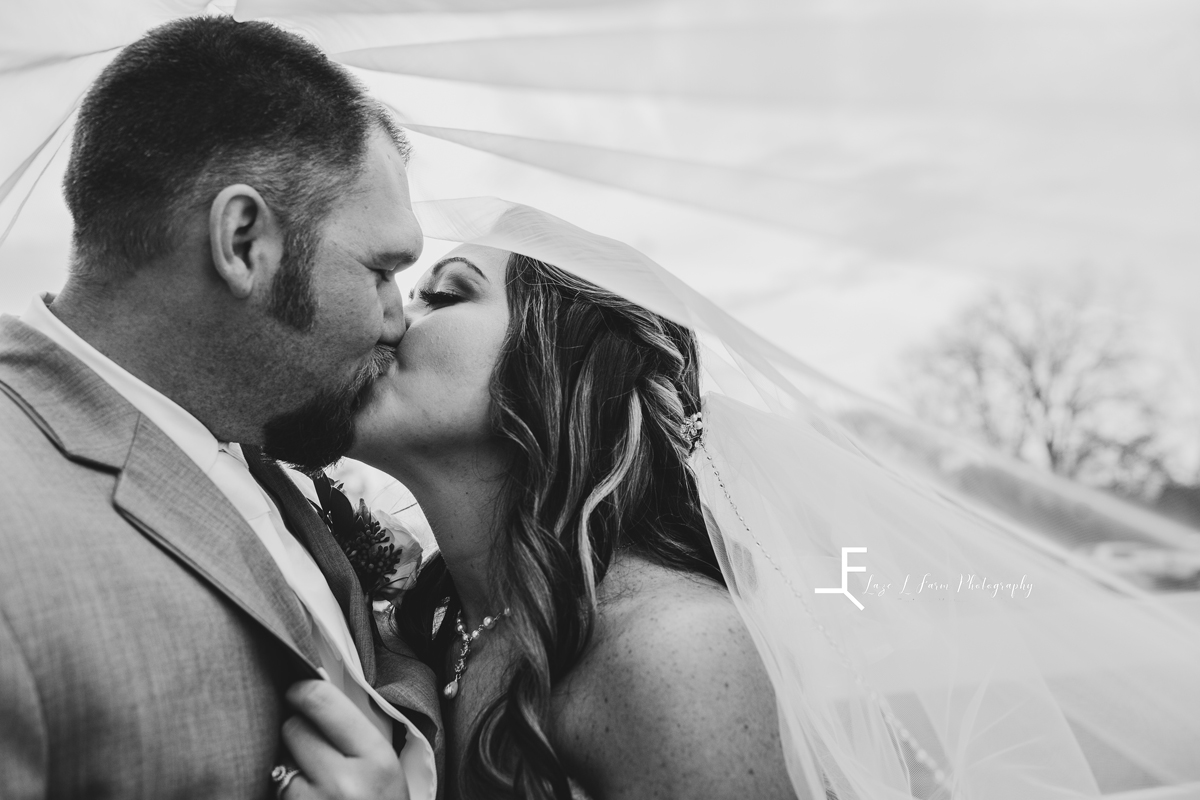 Laze L Farm Photography | Wedding | Legacy Stables - Winston Salem NC | couple kissing under the veil