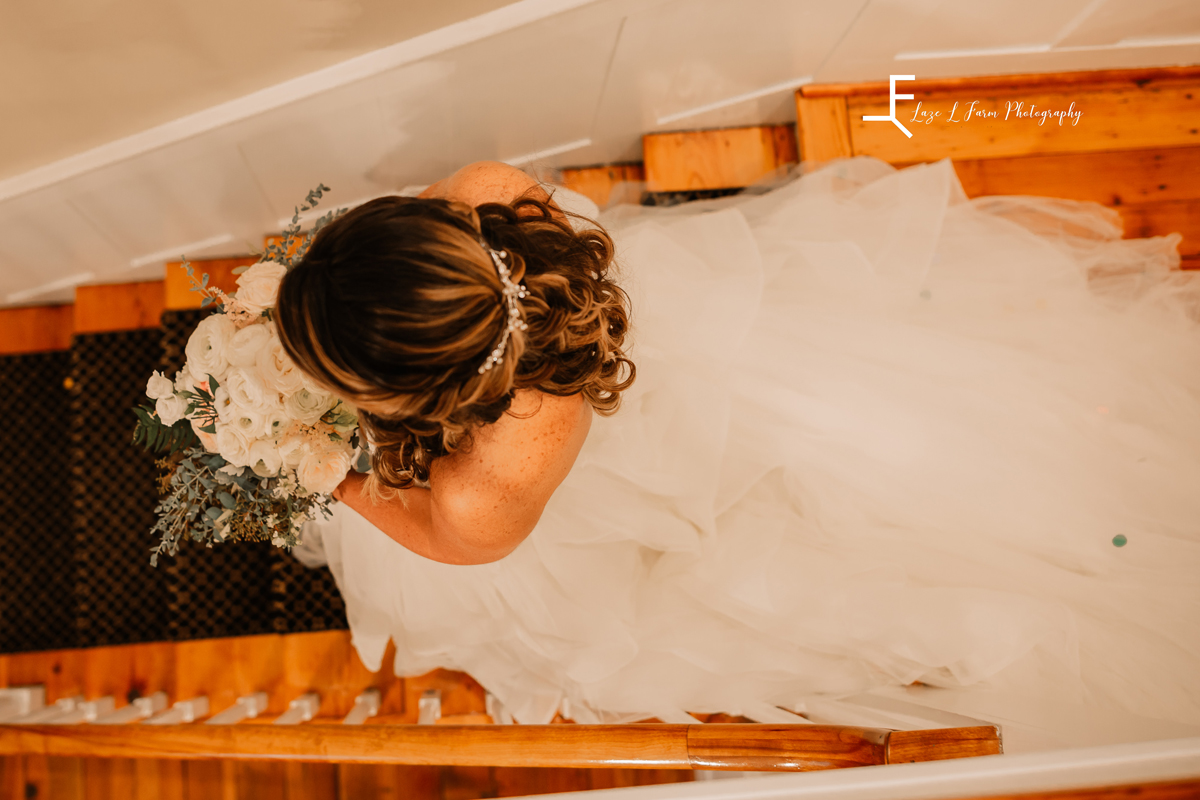 Laze L Farm Photography | Wedding | Legacy Stables - Winston Salem NC | looking down on the bride walking down the stairs