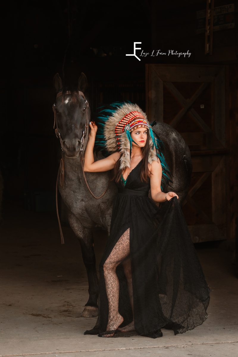 Laze L Farm Photography | Equine Photoshoot | Hamptonville NC | girl posed wearing indian headdress with horse