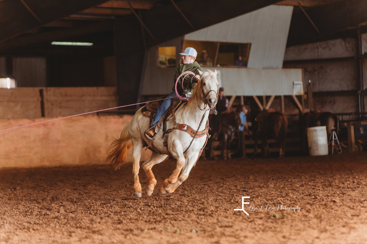 Laze L Farm Photography | Team Roping | H+H Arena | action shot of one horse and rider roping