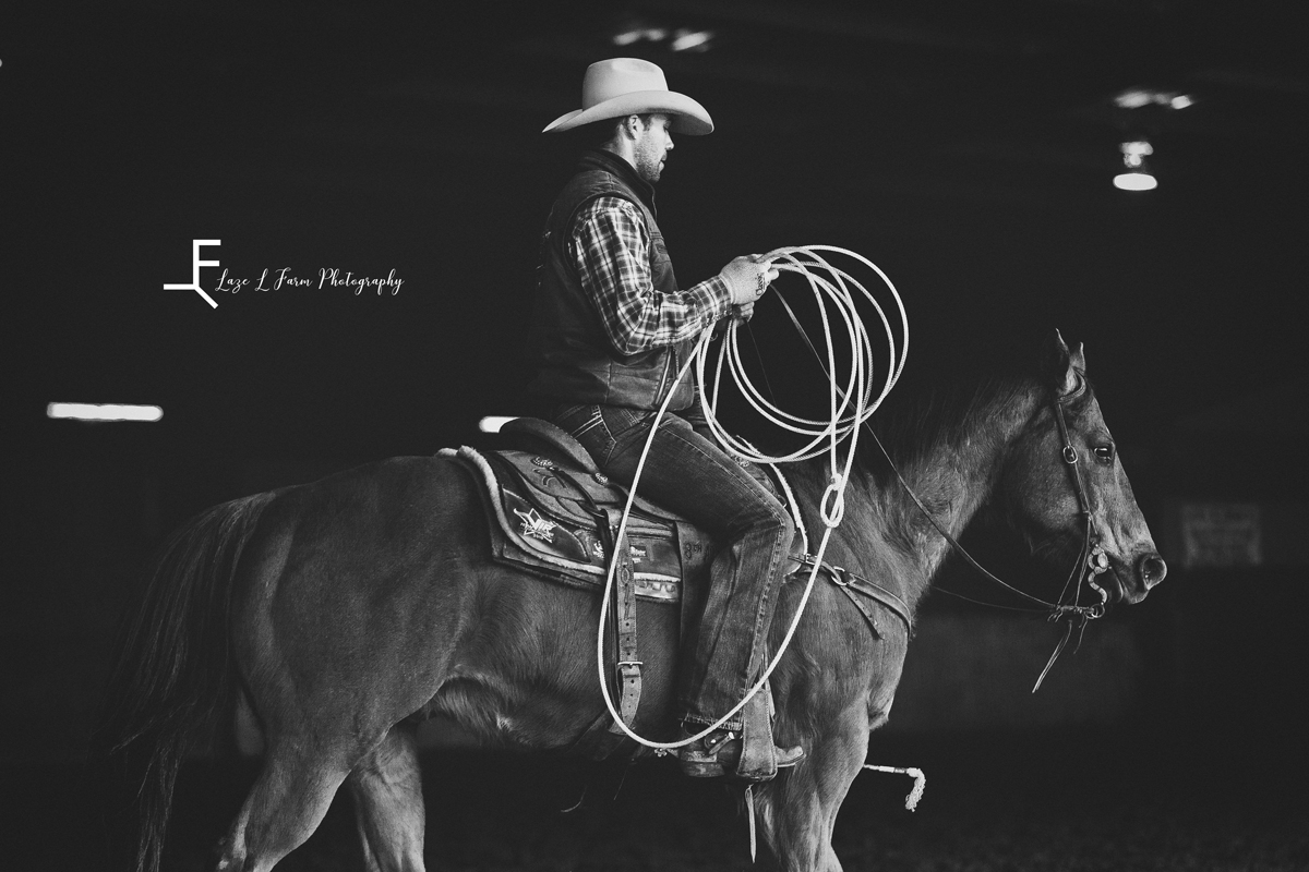 Laze L Farm Photography | Team Roping | H+H Arena | black and white horse and rider arena roping