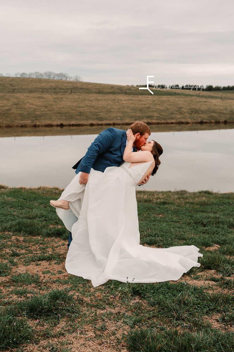 Laze L Farm Photography | Wedding | The Emerald Hill - Hiddenite NC | groom dipping bride and kissing