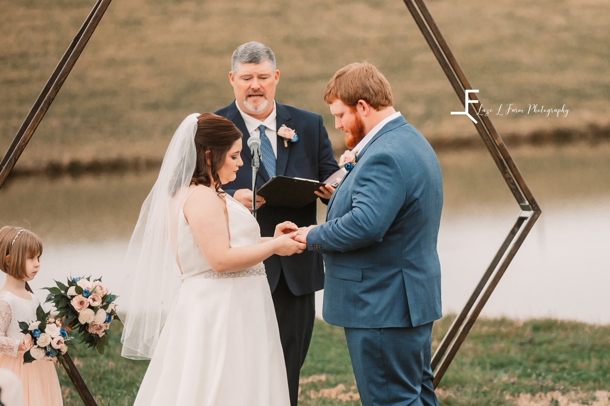 Laze L Farm Photography | Wedding | The Emerald Hill - Hiddenite NC | bride putting ring on groom