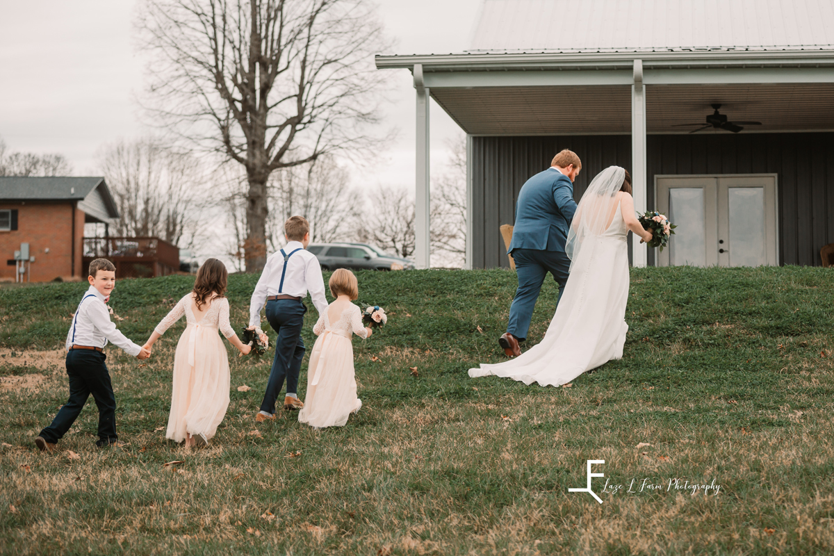 Laze L Farm Photography | Wedding | The Emerald Hill - Hiddenite NC | bridal party walking down the aisle