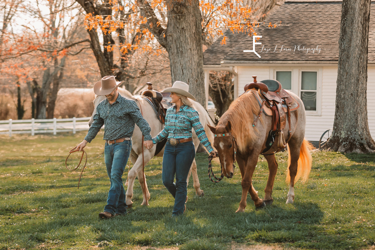 Laze L Farm Photography | Western Lifestyle | Lenoir NC | couple walking their horses