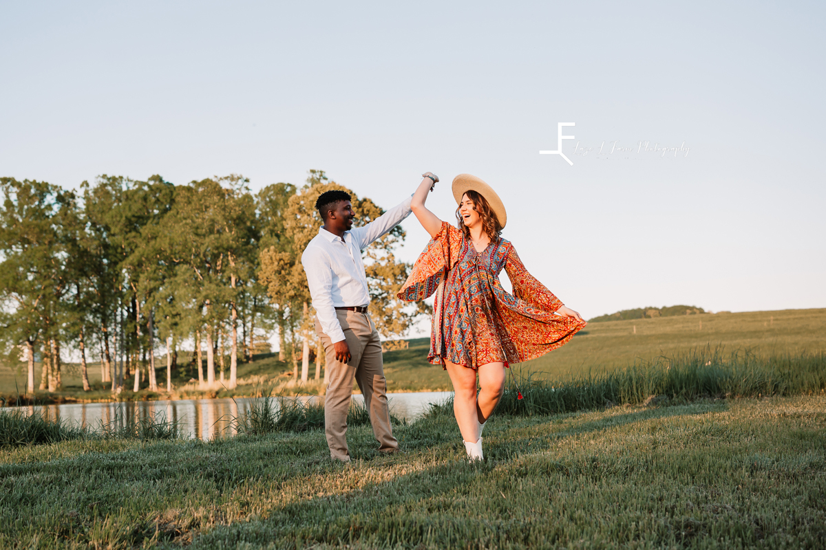 Laze L Farm Photography | Engagement Session | The Emerald Hill - Hiddenite NC | dancing in front of the pond