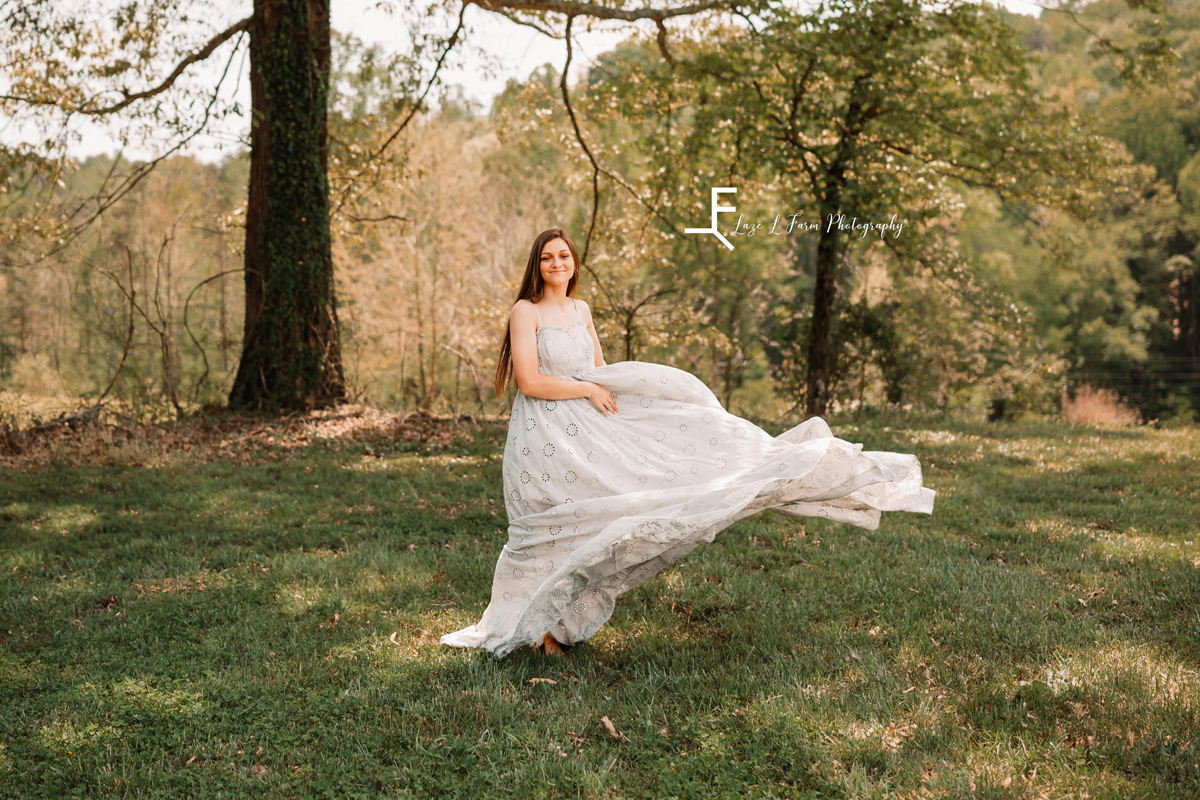 Laze L Farm Photography | Fairytale Dress Photoshoot | Taylorsville NC | standing twirling the dress