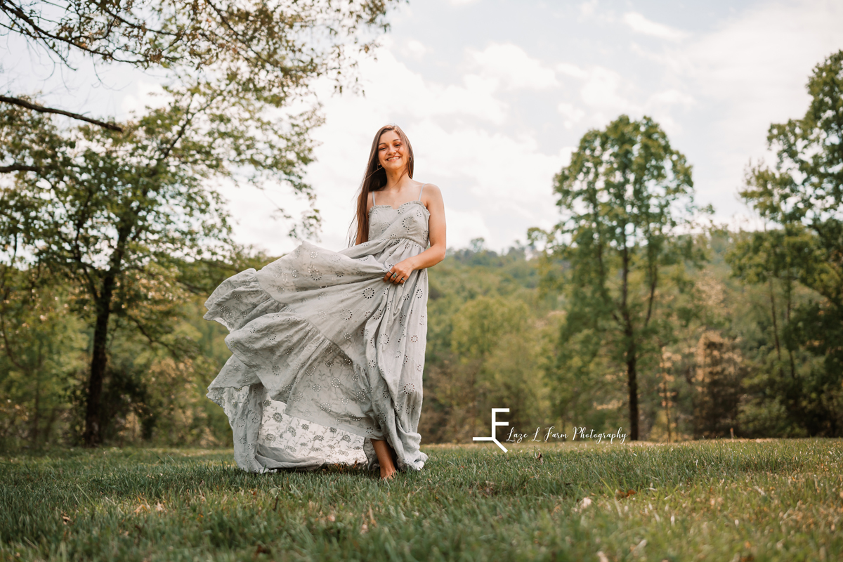 Laze L Farm Photography | Fairytale Dress Photoshoot | Taylorsville NC | candid twirling dress walking towards the camera