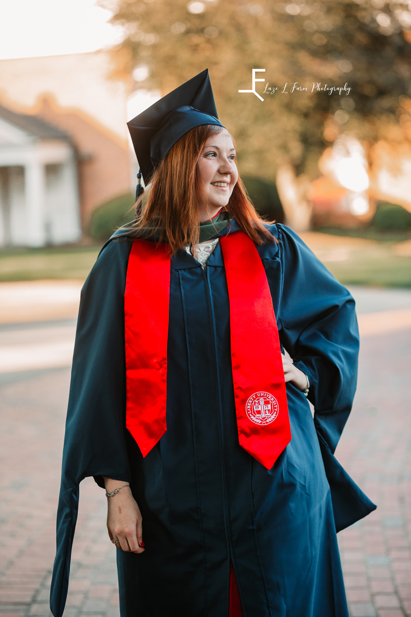 Laze L Farm Photography | Graduation Photoshoot | Statesville NC | posed looking away wearing grad gown