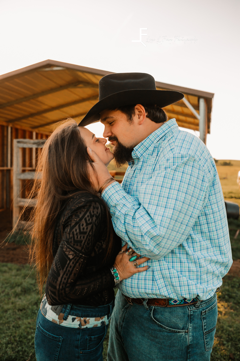 Laze L Farm Photography | Western Engagement Photoshoot | Cowpens SC | kissing on the farm