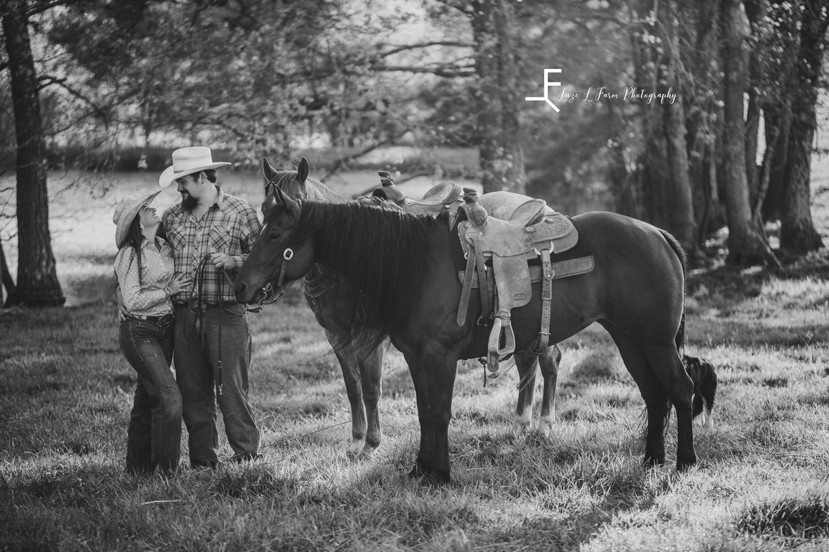 Laze L Farm Photography | Western Engagement Photoshoot | Cowpens SC | black and white standing with the horses
