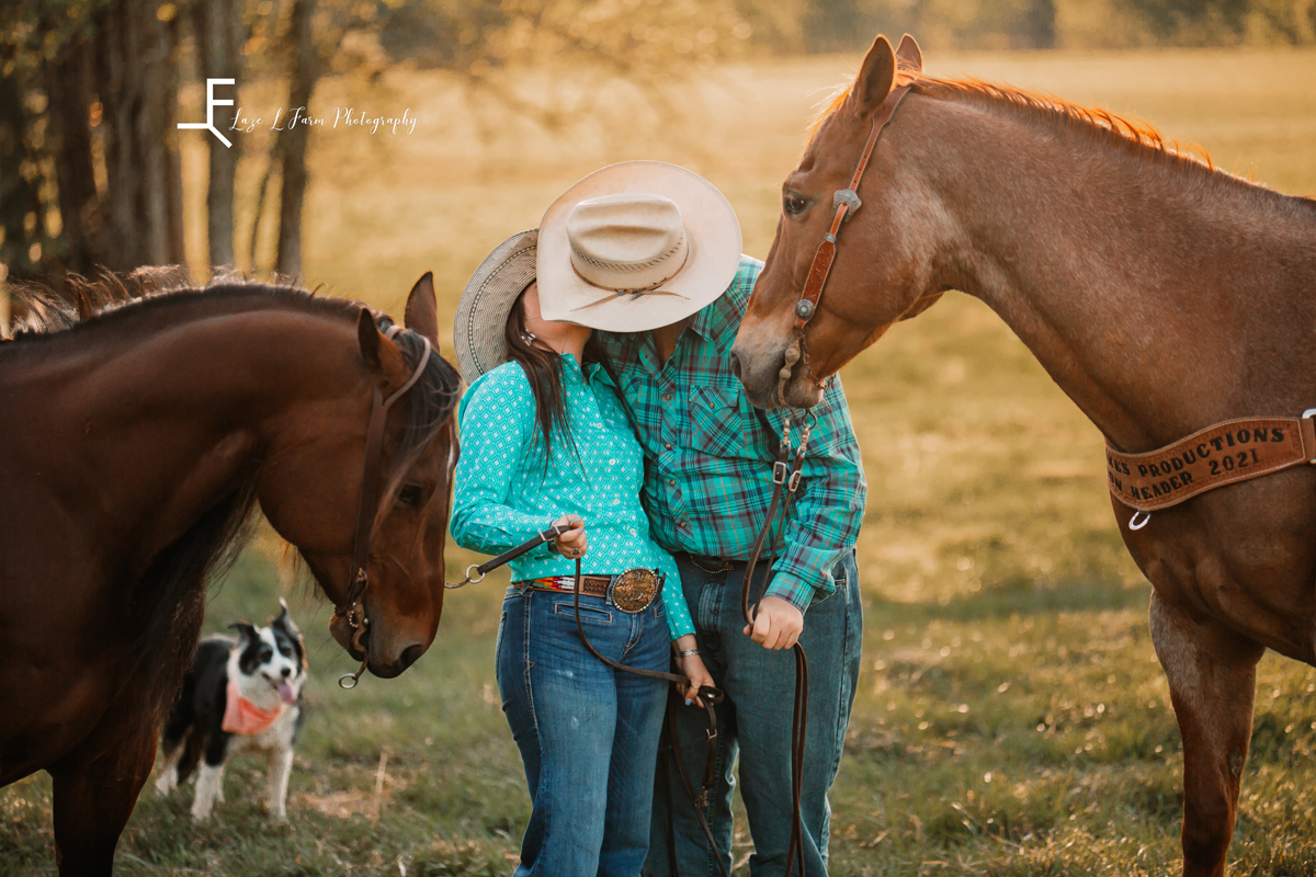 Laze L Farm Photography | Western Engagement Photoshoot | Cowpens SC | kissing beside the horses